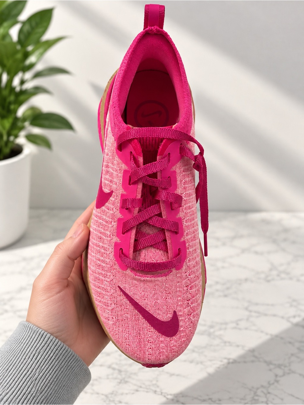 Nike Women’s Hot Pink Flyknit Athletic Shoe
